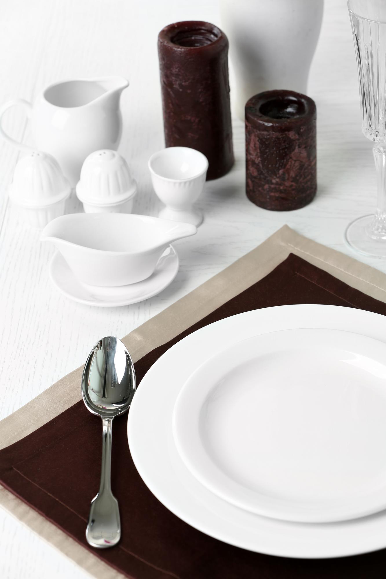 Workshop table set for tasting with plates and utensils